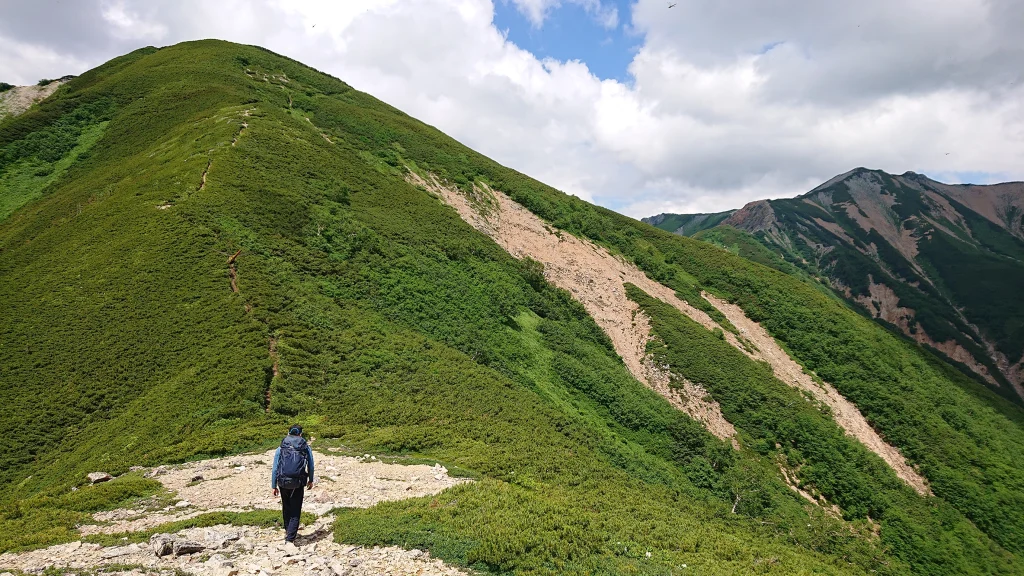 hiker-green-mountain